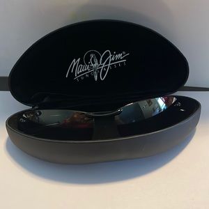 Maui Jim sports black sunglasses
